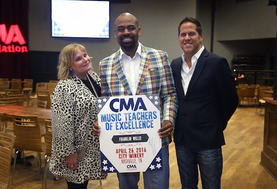 CMA Music Teacher of Excellence Franklin Willis, Choral Director at Madison Middle Prep (center), with Dr. Nola Jones, Coordinator of Visual and Performing Arts, Metro Nashville Public Schools, and Jon Loba, Executive Vice President, BBR Music Group and CMA Board member, at the CMA Music Teacher of Excellence honors at City Winery Tuesday in Nashville. Photo: Kayla Schoen / CMA