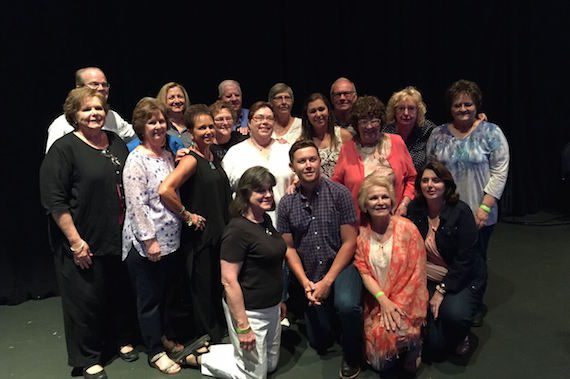 Scotty McCreery poses with a group of his fan club members who surprised him at his Fifth Annual Fan Club Party by donating $1,200 to the Opry Trust Fund in his honor. Photo: Scott Stem