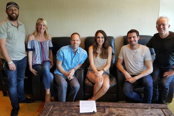 Pictured (L-R): Chris Alderman, Manager, Rough Hollow Entertainment; Stephanie Green, Deluge Music; Mark Friedman, President, Deluge Music; Jennifer Fiedler and Trey Smith of Smithfield; David Robkin, managing member, Deluge Music