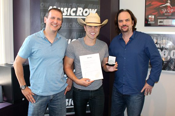 Pictured (L-R): Troy Stephenson, Chart Director, MusicRow; Dustin Lynch; Sherod Robertson, Owner/Publisher, MusicRow