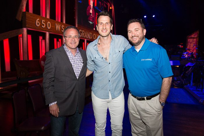 Pictured (L-R): Pete Fisher,Grand Ole Opry; Russell Dickerson; J.R. Schumann, Sirius XM