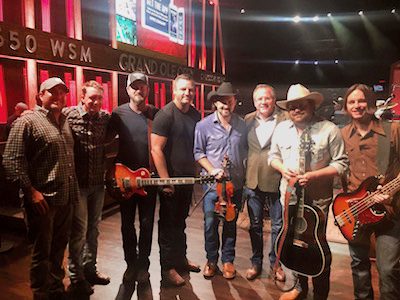 Photo ID (L-R): Enzo DeVincenzo, Red Light Management; Todd Stewart, utility player; Geoffrey Hill, guitar; Les Lawless, drums; Brady Black, fiddle; Pete Fisher, Grand Ole Opry; Randy Rogers, lead vocals; Jon Richardson, bass guitar 