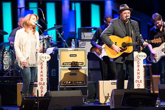 Longtime friend Patty Loveless performs "When I Call Your Name" and "Go Rest High On That Mountain" with Vince Gill.