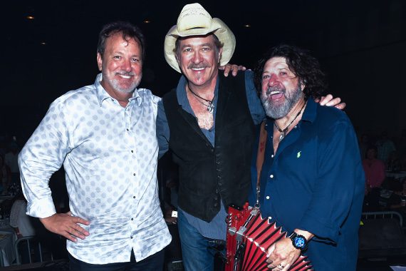 Kix Brooks (center) gathers with event organizers Chris Foreman (left) and Wayne Toups at #AcadianaStrong, a concert to benefit flood victims in South Louisiana. Photo: Scott Clause