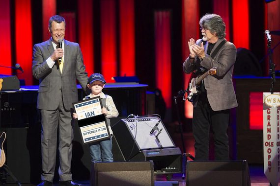 Pictured (L-R): Opry announcer Bill Cody, Ian, Alabama's Randy Owen. Photo: Chris Hollo for the Grand Ole Opry