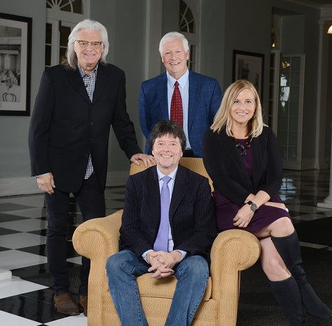 Pictured (seated): Ken Burns. Standing: Ricky Skaggs; Dr. Bob Fisher, Chairman of the Board of Trustees of Belmont University; Mayor Megan Barry.