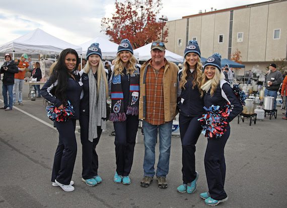 Tracy Lawrence Stands with Titans Cheerleaders at 11th Annual Mission: Possible Turkey Fry. Photo: Jon-Paul Bruno